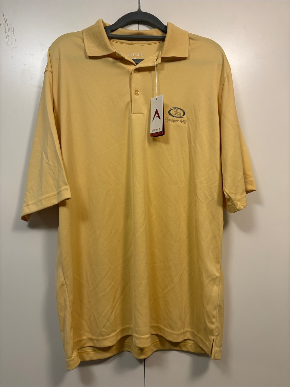NWT Antigua Men's Pale Yellow Polo Golf Shirt with Juniper Hill Logo M